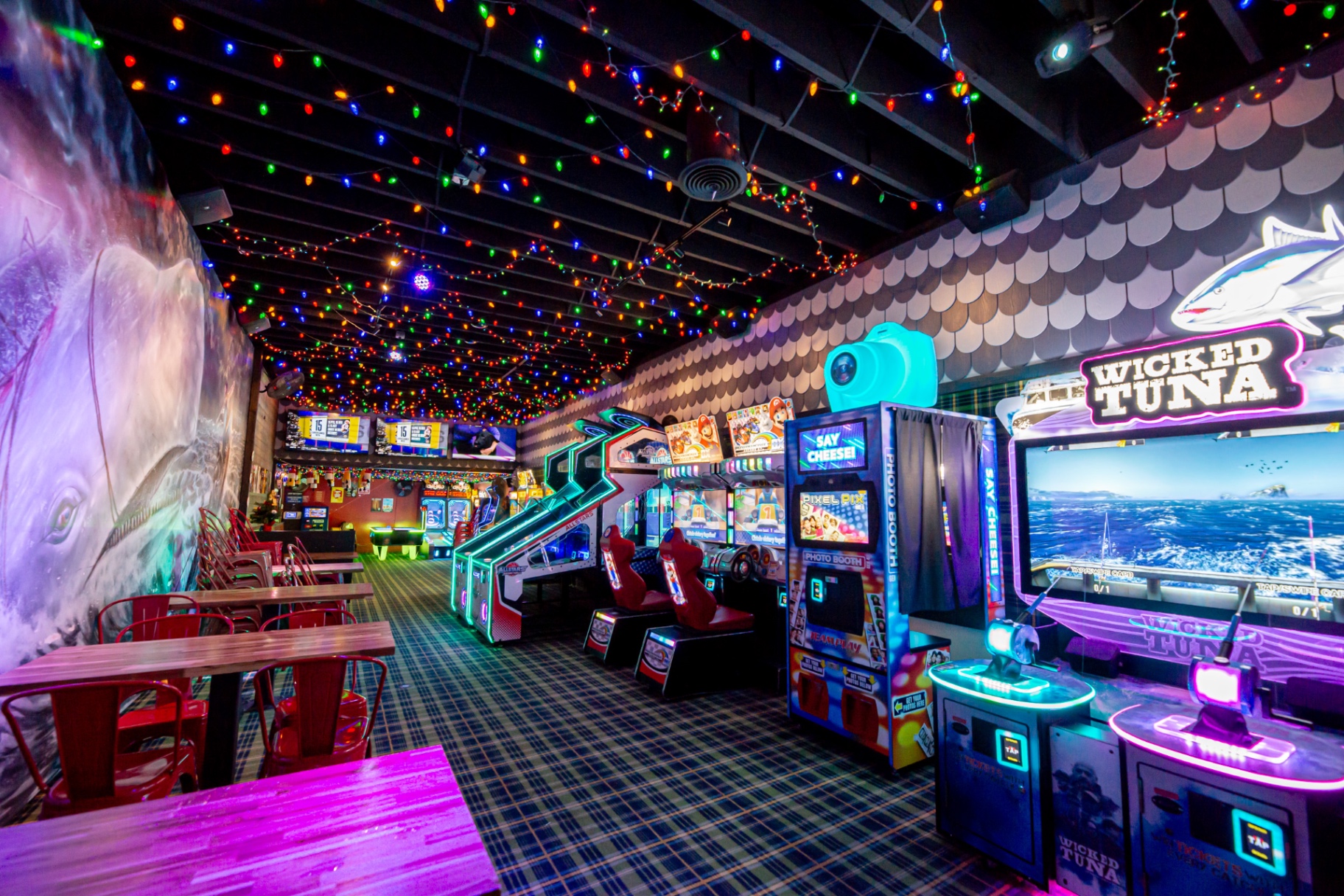 Wicked Tuna, Mario Kart, and photo booth arcade games at Harbor Town Pub